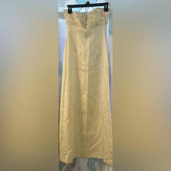 Ivory/cream dress with spaghetti straps and a zipper in the back. Gently used. - Picture 3 of 11